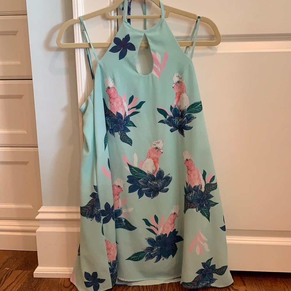 Patterned bright dress with bird design
